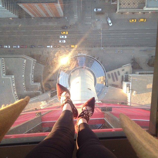 Always fearless, Gail stands on glass floor high above Calgary.